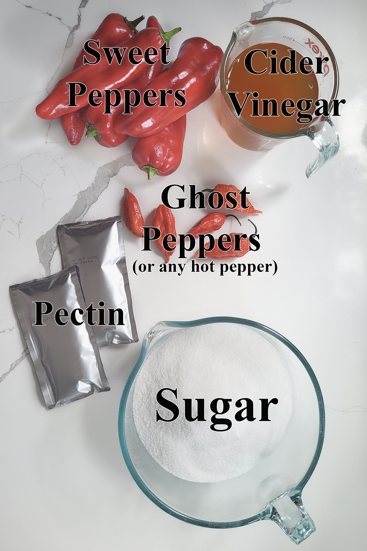 ingredients for hot pepper jelly on a white surface.