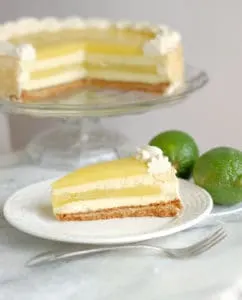 a slice of lime layered cheesecake