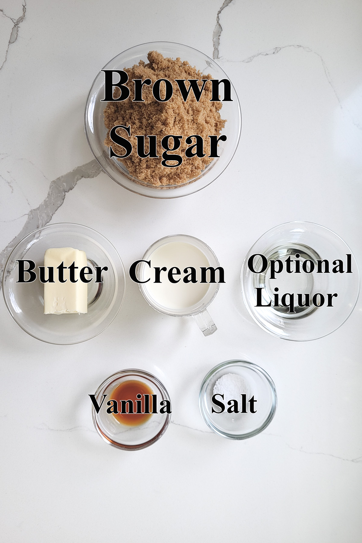 ingredients for butterscotch sauce in glass bowls.