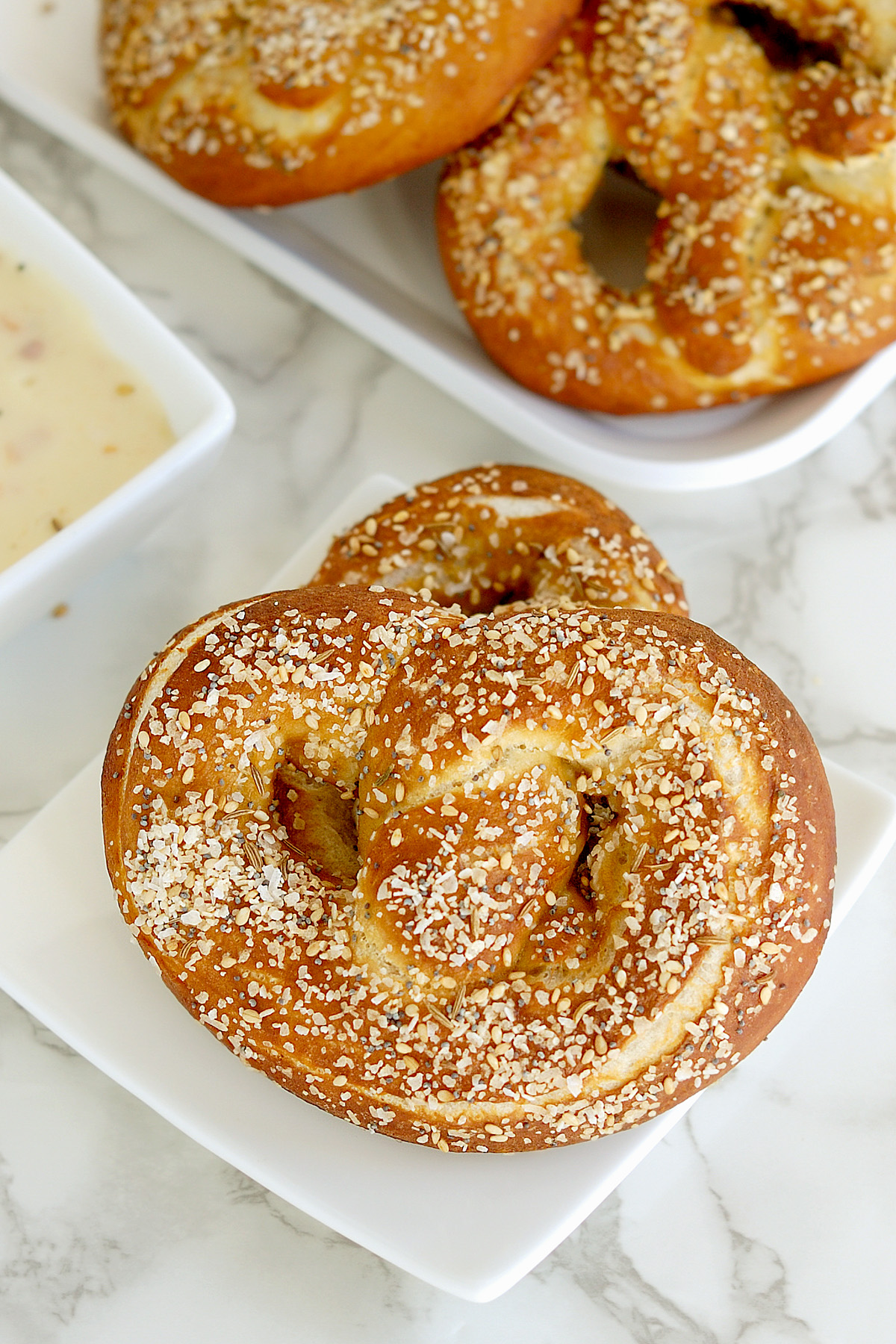 sourdough pretzels on a white plate.