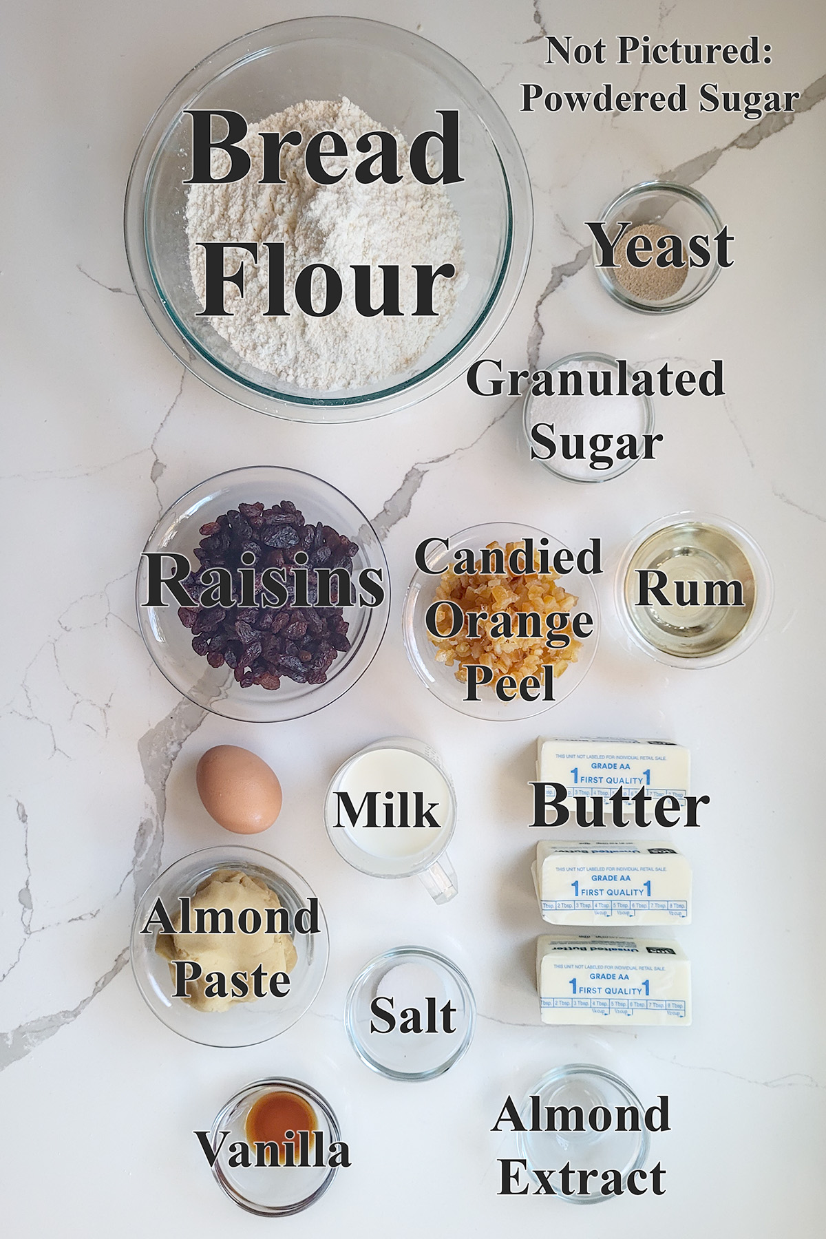 ingredients for almond stollen in glass bowls.