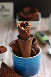 a stack of chocolate ice cream cones