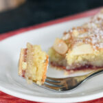 a piece of bakewell tart on a fork.