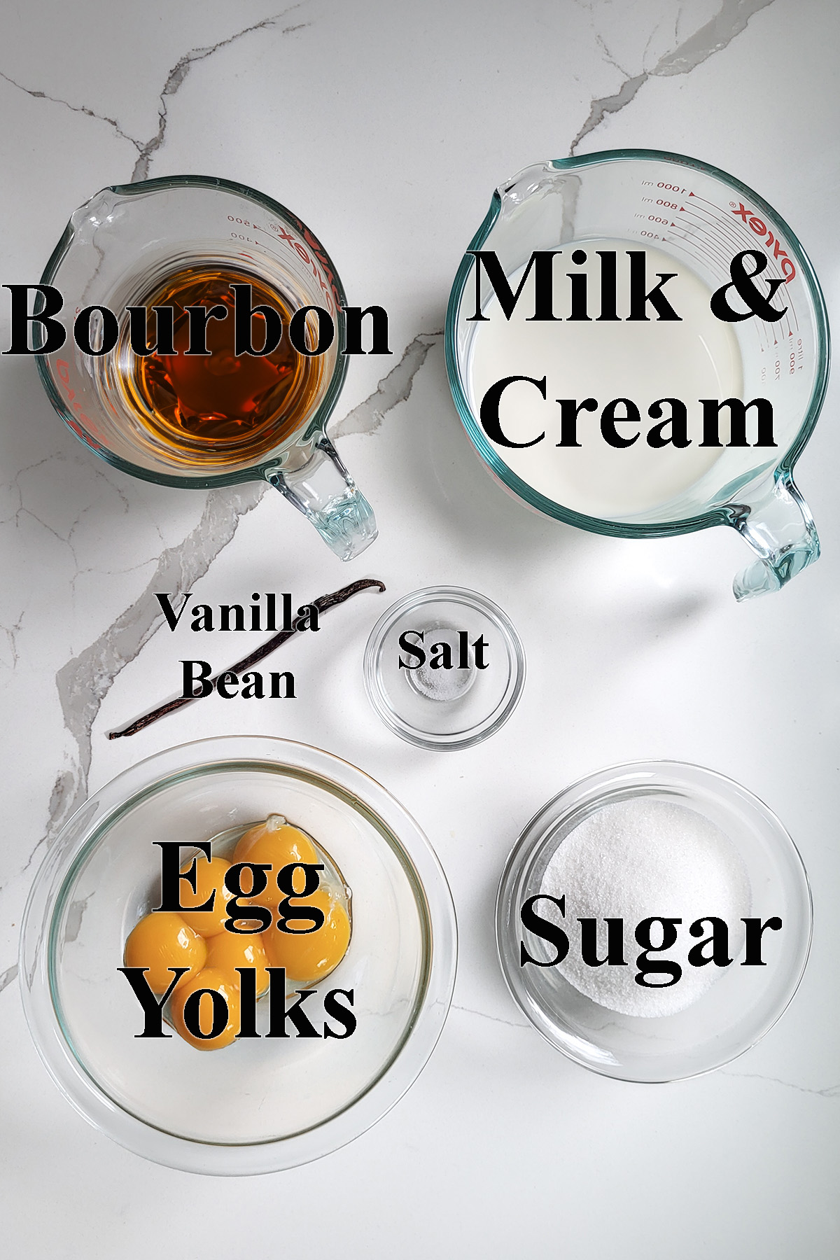 ingredients for bourbon ice cream in glass bowls.