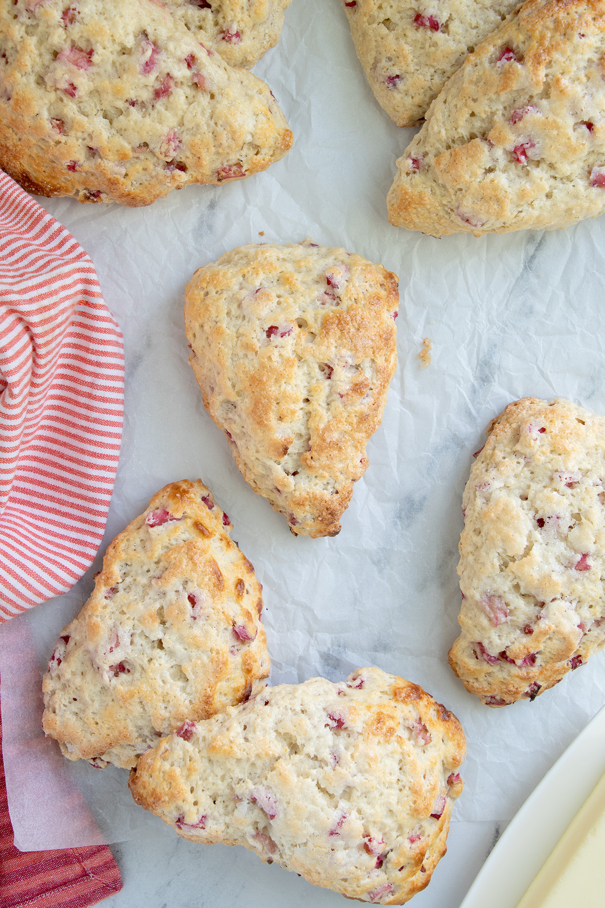 rhubarb scones on a piece of parchment paper.