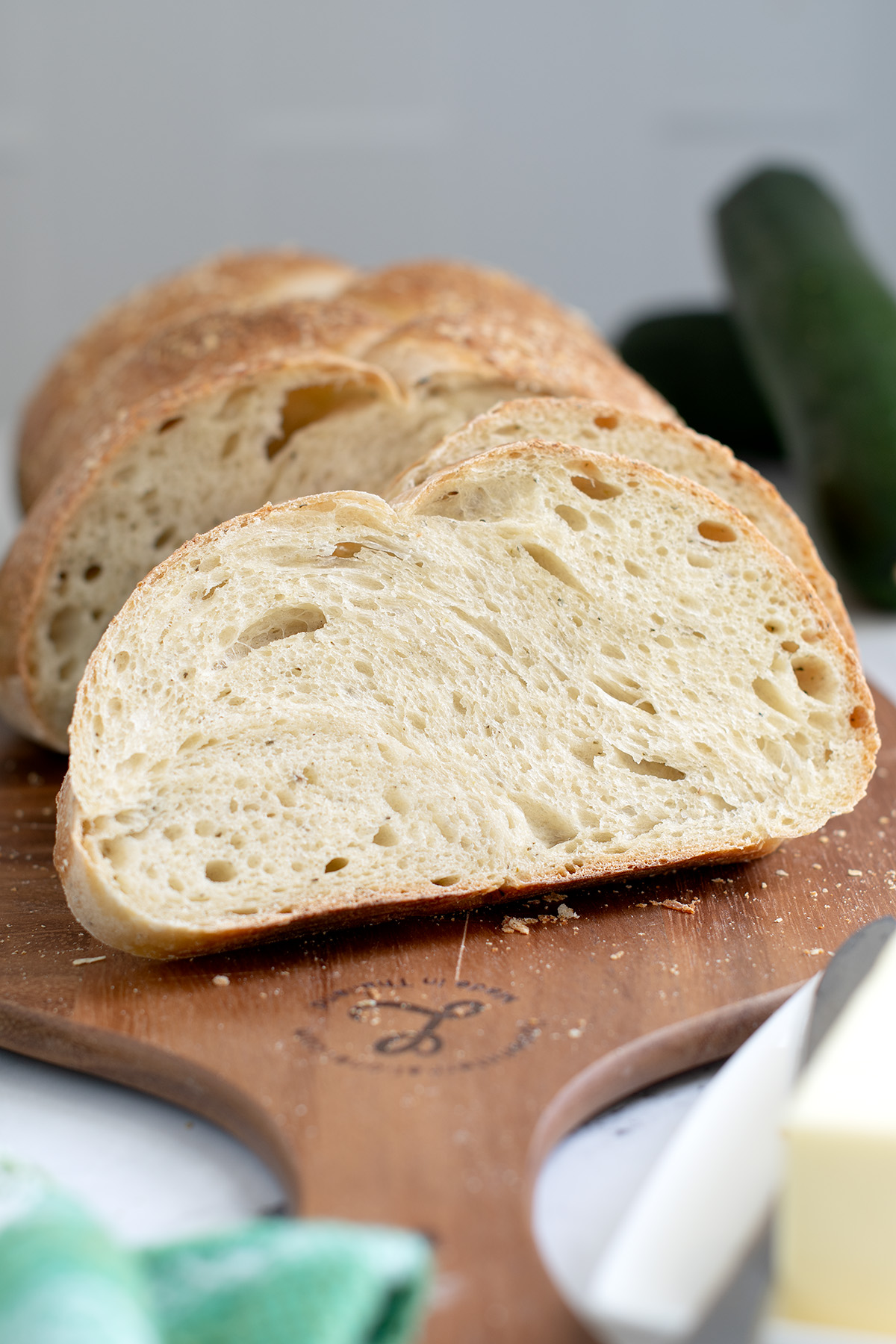 slices of sourdough bread on a cutting board.