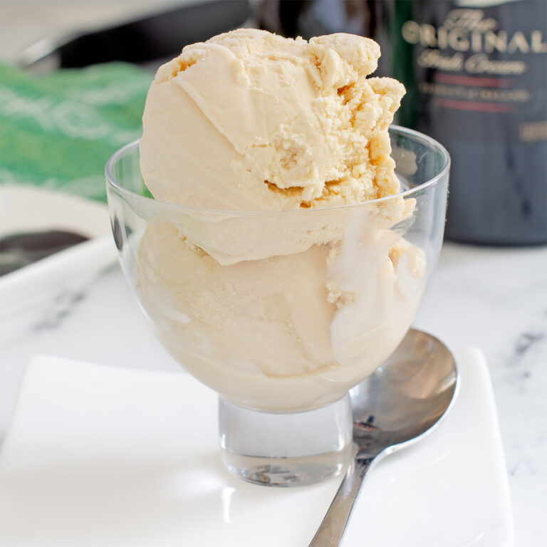 a glass dish filled with baileys ice cream.