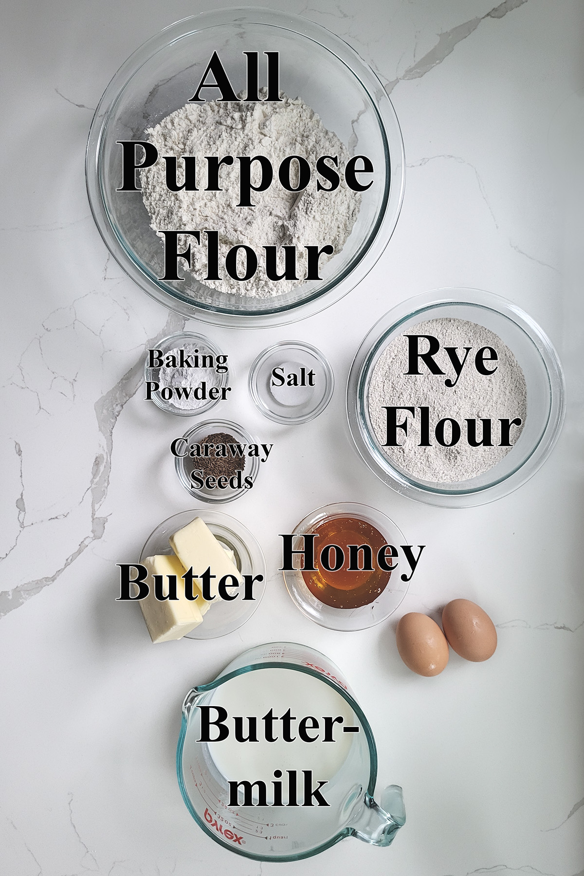 ingredients for rye scones in glass bowls.