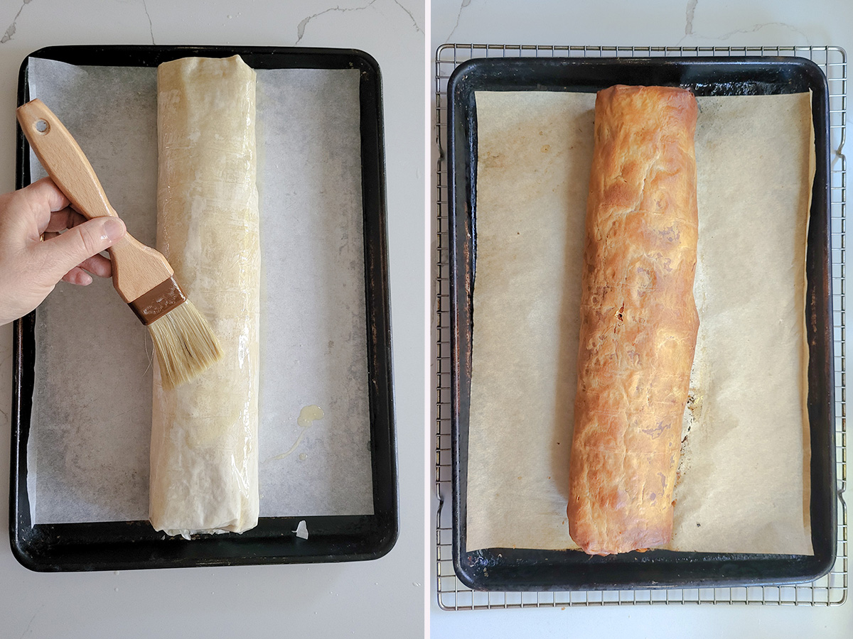 a strudel on a baking pan being brushed with butter. 