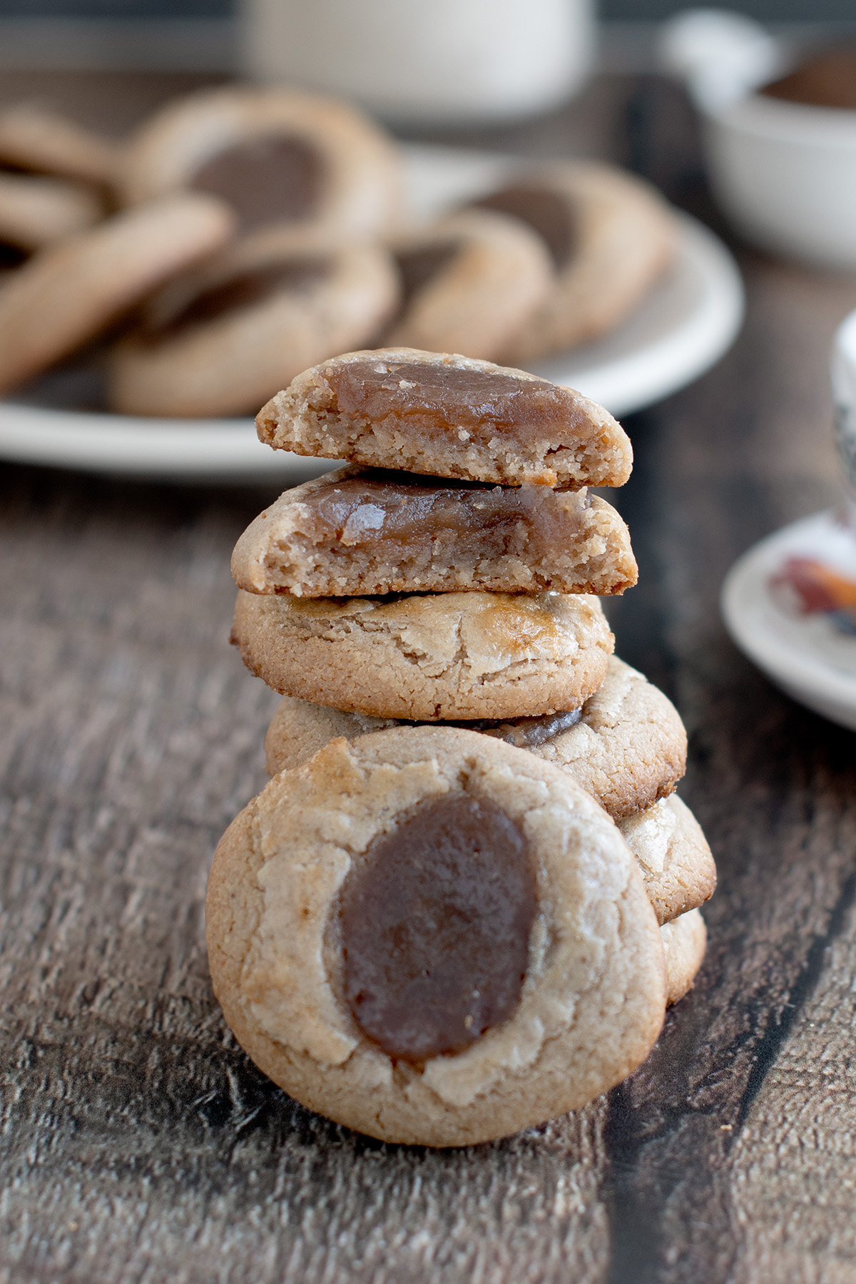 a stack of chestnut cookies on a wooden table. 