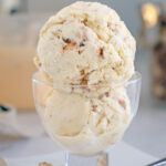 a glass dish of hazelnut ice cream.