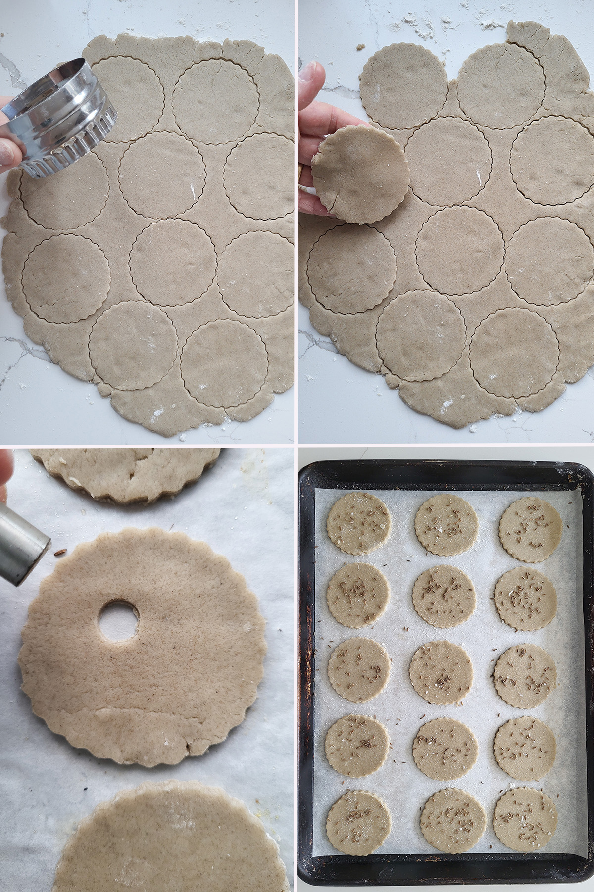 rye cookie dough with cutouts on a marble surface. A tray of unbaked cookies.