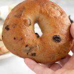 a PINTerest image for cinnamon raisin bagel recipe with text overlay.