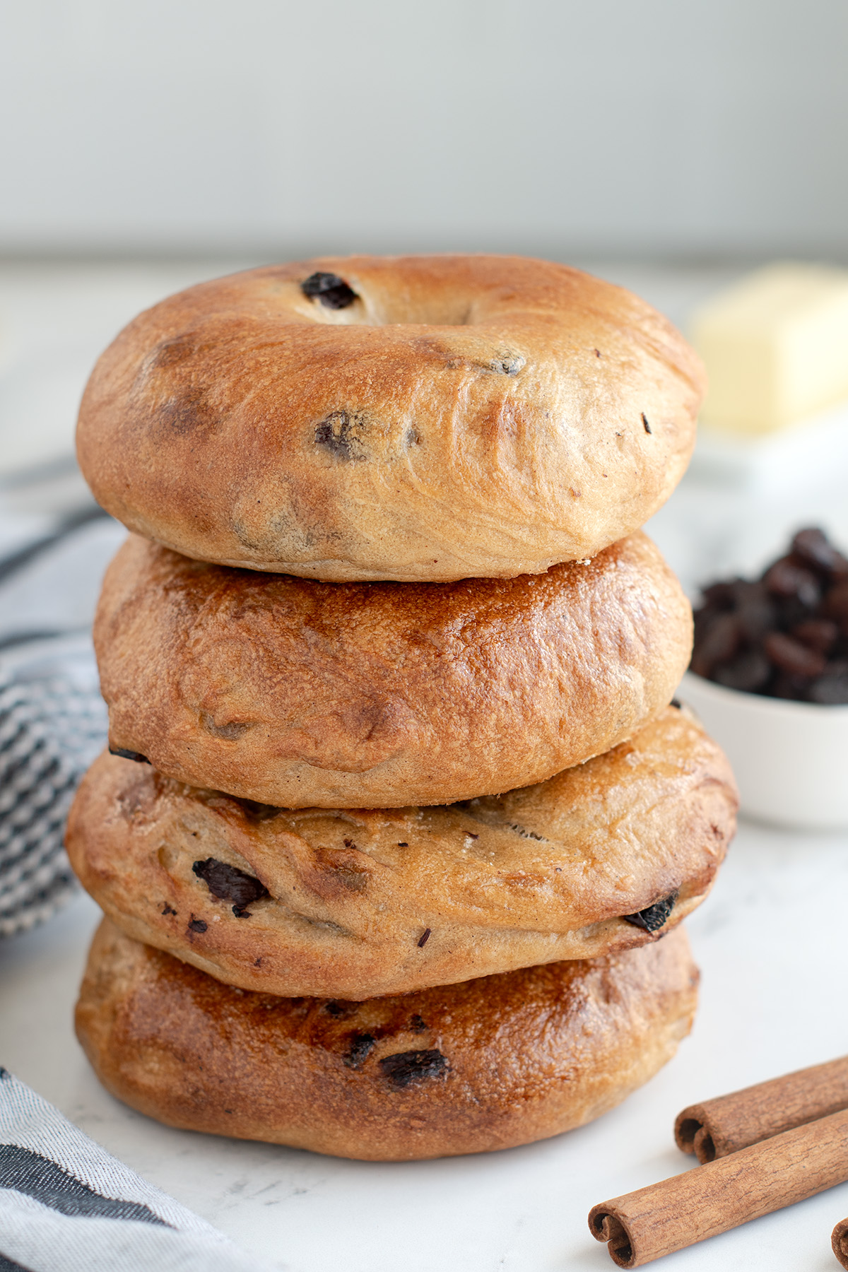 a stack of cinnamon raisin bagels.