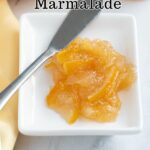 a pinterest image for meyer lemon marmalade with text overlay.