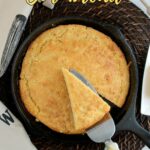 a pinterest image for skillet cornbread with text overlay.