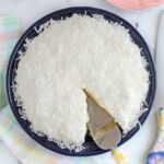 a pinterest image for coconut cream pie with text overlay.